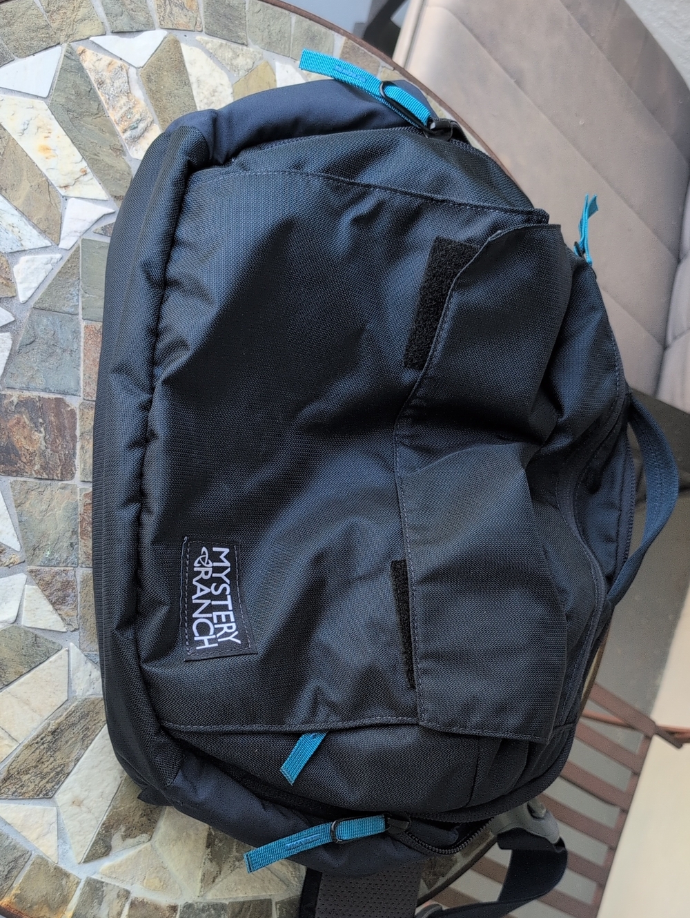 MYSTERY RANCH District Pro Messenger Bag. Navy Blue with Teal Accent Pulls